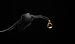Black gasoline injector fueling oil or pure fuel on dark background. 3D rendering.