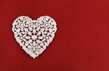 Beautiful White Heart On Red Textured Paper