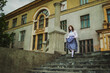 © Grigoriy Lukyanov - Cheerful girl runs down the steps