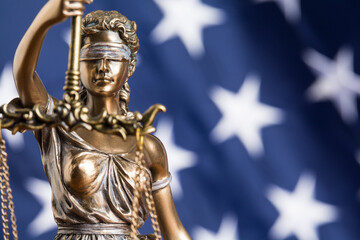 Canvas Print - The statue of justice Themis or Justitia, the blindfolded goddess of justice against the flag of the United States of America, as a legal concept