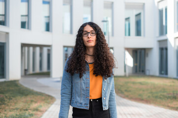 Portrait of transgender woman with afro hair.