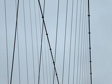 Low Angle View Of Suspension Bridge Against Clear Sky