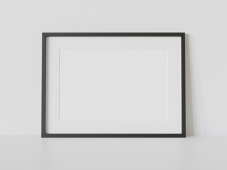 Aufkleber - Black frame leaning on white floor in interior mockup. Template of a picture framed on a wall 3D rendering
