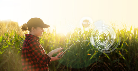 Fototapete - Farmer  with a digital tablet in the agricultural field.