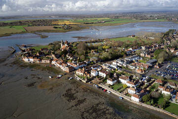 Wall Mural - Bosham Village and estuary aerial view with dramatic cumulus cloud on the horizon.