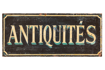 Ancient advertisement sign with the French text 