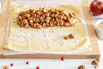 Wall Mural - making strudel - dough, apples, cinnamon, nuts, brown sugar. process and ingredients