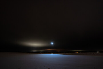 Wall Mural - light painting with drone at cold winter night night. Winter landscape.
