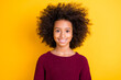 Photo of satisfied dark skin little girl toothy smile look camera wear sweater isolated on yellow color background