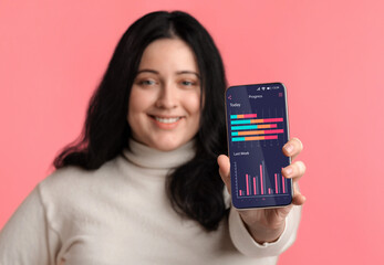 Aufkleber - Weightloss Progress App. Plus Size Woman Showing Smartphone Application For Activity Tracking