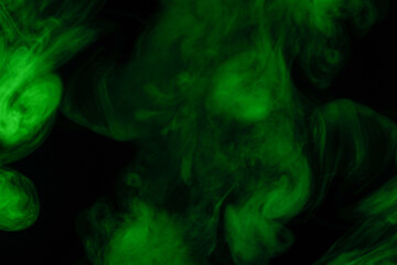 Green steam on a black background.