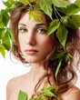 © Svetlana Fedoseeva - Beauty Spring. Woman with Fresh green leaves in hair. Summer Nature Girl portrait. Beauty Spring Girl. Springtime.