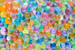 Abstract multicolored background with hydrogel beads texture