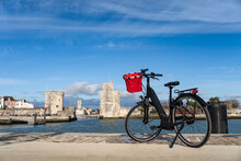 La Rochelle Old Harbor. Rear View Of A Bicycle Looking At City View While Standing On Observation Point. 