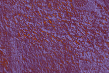Closeup Shot Of An Old Puple Weathered Grunge Wall Pattern As Background Or Wallpaper