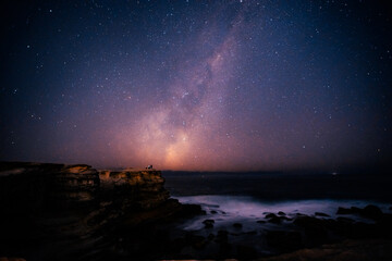 milky way aurora over the sea