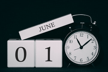 Important date and event on a black and white calendar. Cube date and month, day 1 June. Summer season.