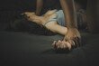 © releon8211 - Sexual abuse is a problem social issues concept, Man's hand holding a woman hand for rape and sexual abuse. Hand focus..