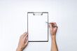 © Andrii - blank clipboard mockup for goals or aspirations at white desk. above view. template for checklist or questionnaire