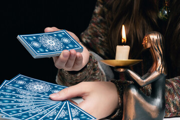 Canvas Print - Fortune teller is reading the future with tarot cards close up.