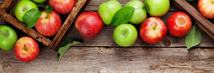 Poster - Green and red apples in wooden boxes