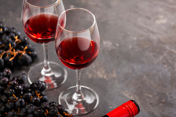 Red wine in glasses on the table, close up