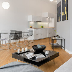 Wall Mural - Black coffee table in modern apartment