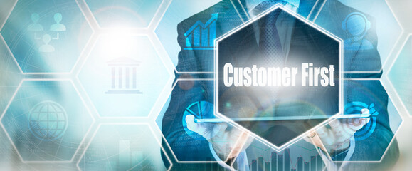 Wall Mural - A Customer First business word concept on a futuristic blue display.