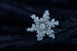© Serenkonata - natural snowflakes on snow, photo real snowflakes. Winter snow background. Snowflake Closeup. Macro photo. Copy space.
