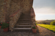 Steps Up To A Rustic Stone Countryside Farmhouse Near Radicondoli In The Province Of Siena In Tuscany, Italy.