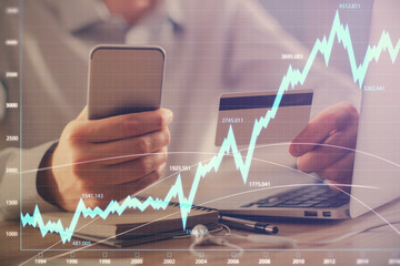 Aufkleber - Double exposure of man hands holding a credit card and Forex graph drawing. Stock trading and digital fintech in Internet E-commerce concept.
