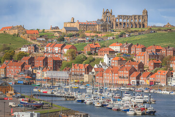 rooftop cityscape view of whitby townscape, river esk harbour, humber estuary, and historical landma