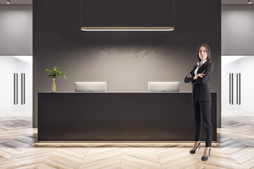 Poster - Businesswoman standing in office lobby