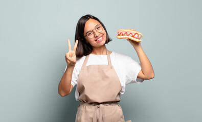 Wall Mural - young pretty chef woman. fast food concept