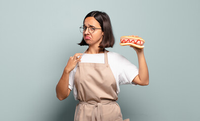 Wall Mural - young pretty chef woman. fast food concept