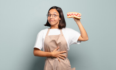 Wall Mural - young pretty chef woman. fast food concept