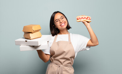 Wall Mural - young pretty chef woman. fast food concept