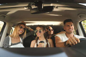 Canvas Print - Happy friends together in car on road trip