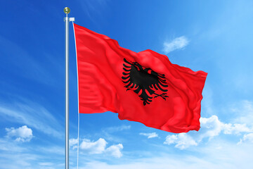 Wall Mural - Albania flag waving on a high quality blue cloudy sky, 3d illustration