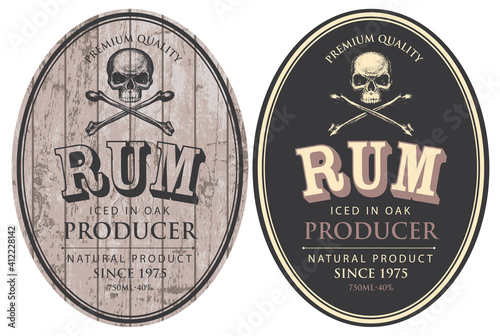 Set of two vector labels for Rum in oval frames with human skulls and crossbones on a wooden and black background in retro style. © paseven