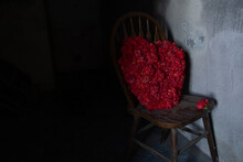 Red Flower Heart On A Wood Chair