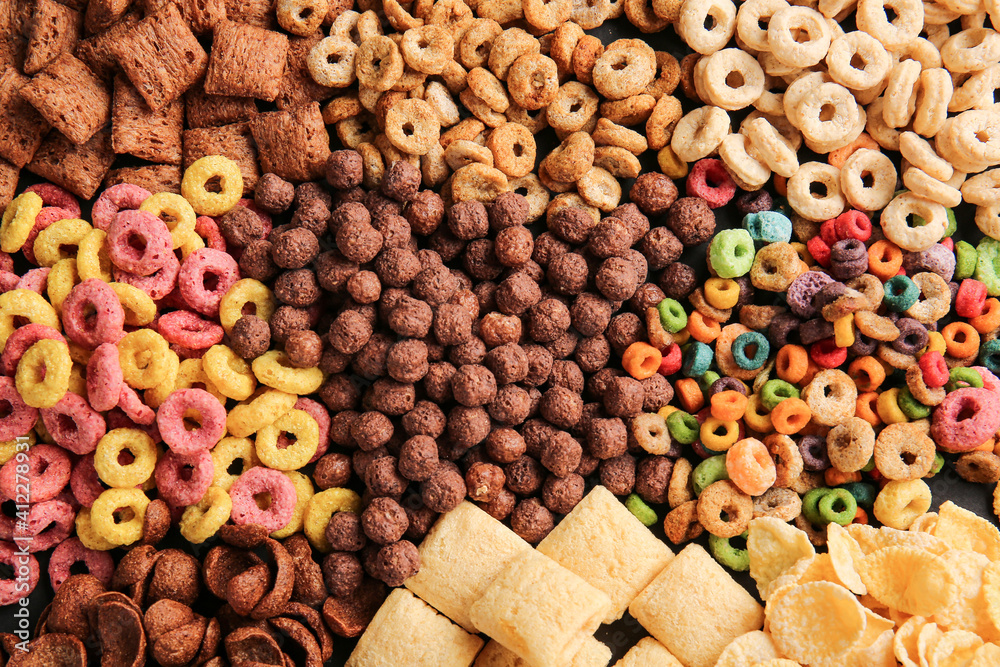 Heap of tasty breakfast cereals as background