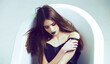 © Volodymyr - woman in dress with long hair, black lipstick in bath