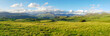 field of grass and mountains in Lake district panorama