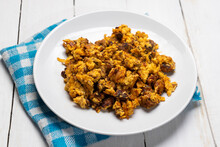 Scrambled Eggs With Chorizo For Breakfast On White Background. Mexican  Food