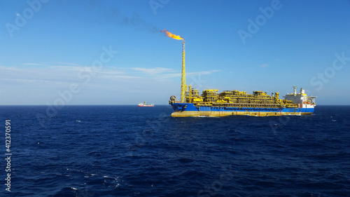 Offshore FPSO ship in production. Floating production, storage, and offloading. (FPSO).