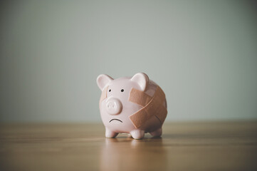 Wall Mural - Piggy bank on wood table. Financial investment and save money concept