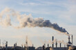 © angeldibilio - This image shows the stacks of a chemical plant releasing pollutants into the atmosphere in Wilmington, Los Angeles.