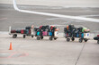 © Per Swantesson/Stocksy - Offloading of luggage from aircraft