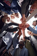 © ASDF - bottom view. international business team showing their unity.